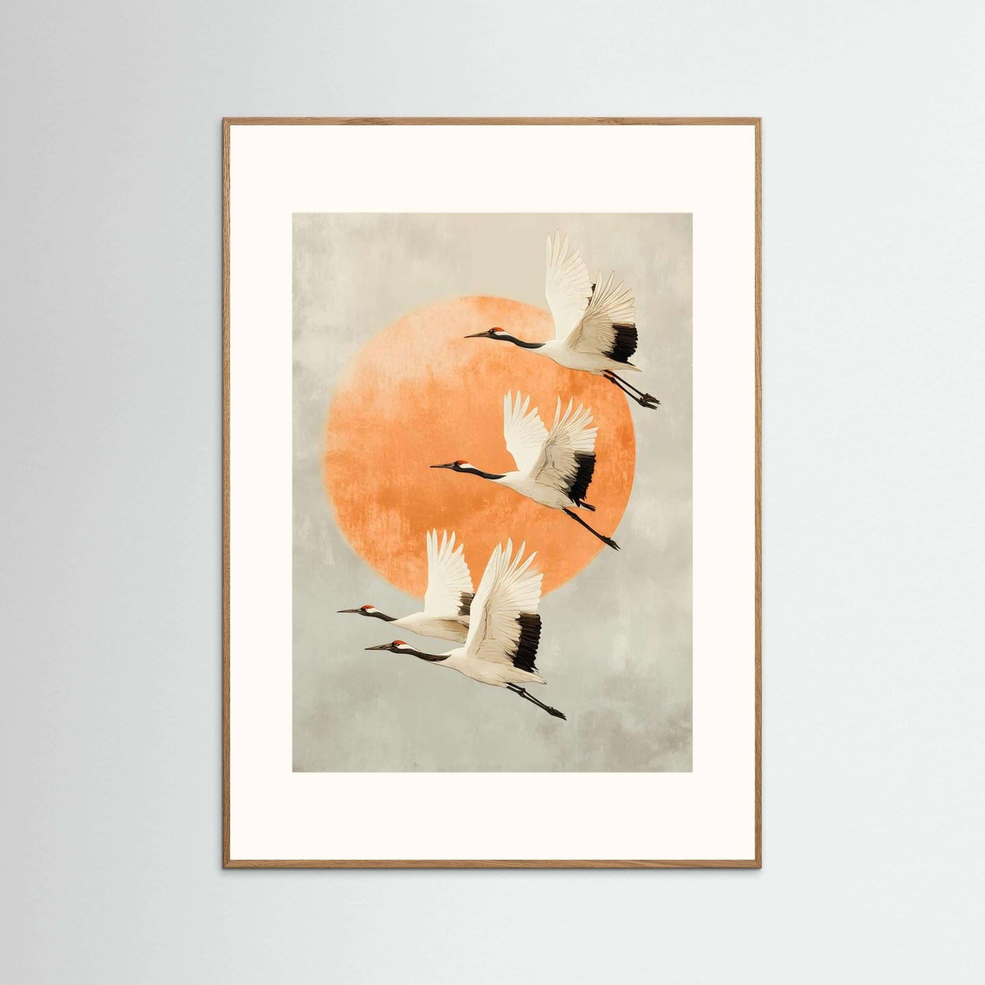 Cranes Wall Art Print featuring minimalist cranes flying against an orange circle, ideal for modern decor.