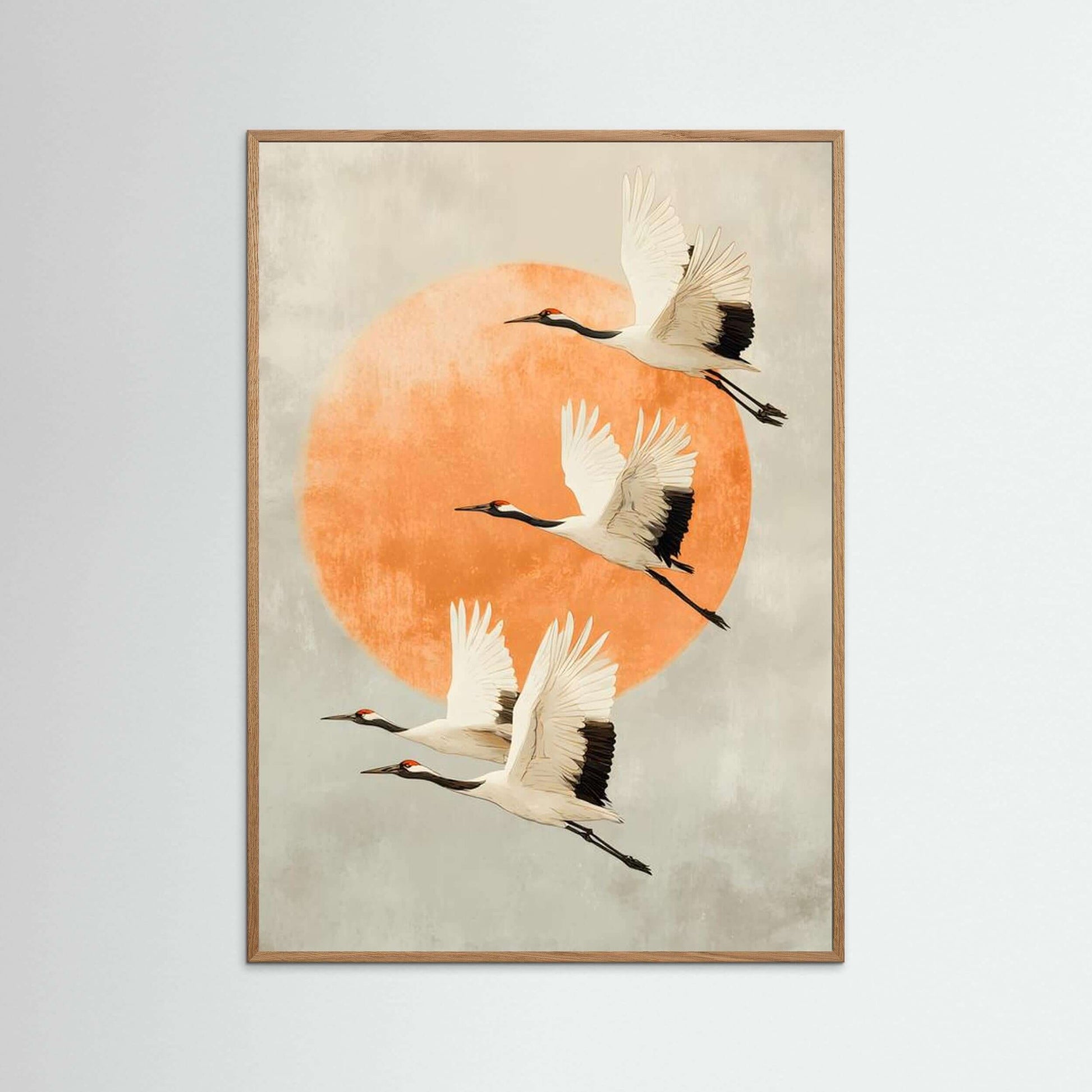 Cranes Wall Art Print featuring minimalist cranes flying against an orange circle, ideal for modern decor.